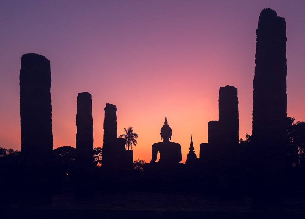 Majestic sunset sky over Big Buddha statue
