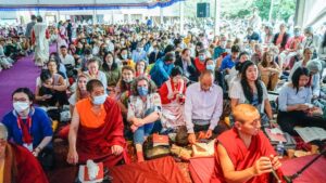 a group of people sitting on the floor