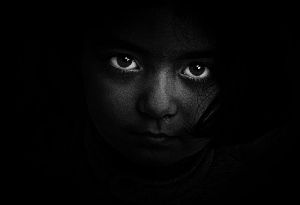 Grayscale Photography of Girl's Face dark
