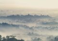 mountain covered by fog